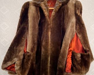 Fur swing cape with burnt orange satin lining XL