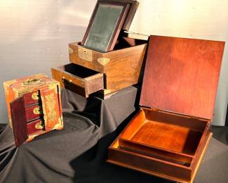 Boxes open- (l) drawers, top. Mirror with drawer, writing desk