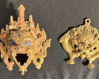 (L) Tibetan Mahakala incense burner (r) Cheppu (mythical water spirit) Nepal