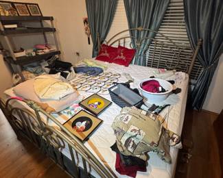 master bedroom through kitchen (mattress not for sale. Frame and bedding for sale)