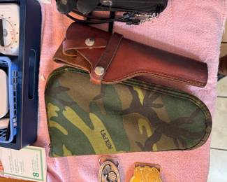 kitchen table. Ruger MK-2 ($225)