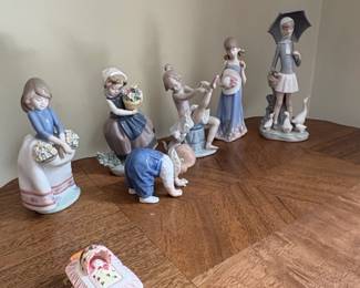 Collection of Lladro Porcelain Figurines, including Courtney and Royal Copenhagen Crawling Child