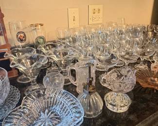 Vintage Brass Candlesticks and Assorted Glassware Collection second image