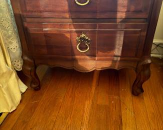 One of a pair of nightstands