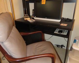 Computer desk and leather desk chair.