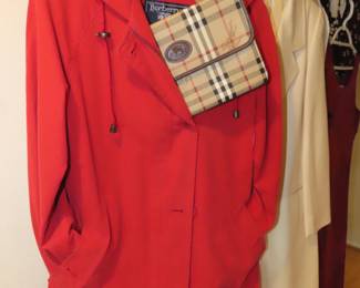Burberry raincoat and clutch purse.