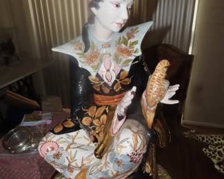 Large hand painted majolica ceramic seated Asian figure by Domenico Poloniato.