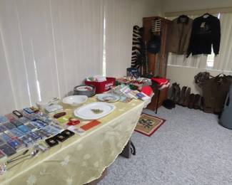 Tea spoons, Christmas, hunting clothing, boots and gun cabinet.