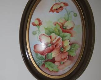 Hand painted porcelain tile.