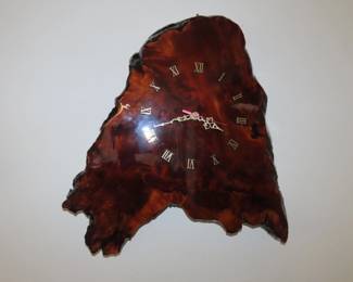 Varnished wood clock.