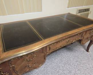 French desk with ornate gilt decorations. 