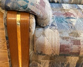 Motion Eaze Upholstered Loveseat with Wood Trim