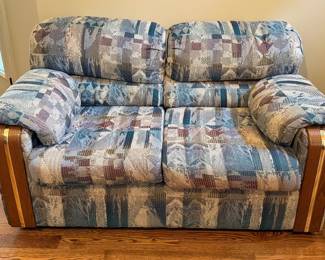 Motion Eaze Upholstered Loveseat with Wood Trim