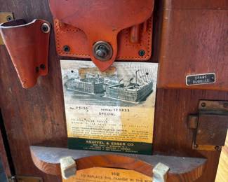 antique Keuffel & Esser surveyor's transit in its original wooden carrying case