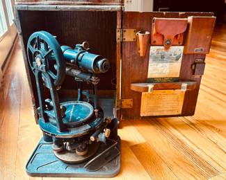 antique Keuffel & Esser surveyor's transit in its original wooden carrying case