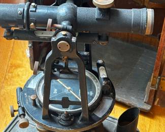 antique Keuffel & Esser surveyor's transit in its original wooden carrying case