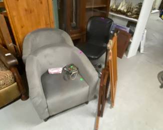 Armchairs, baby gates, vintage clock cabinet