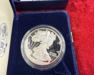Several different commemorative silver dollars