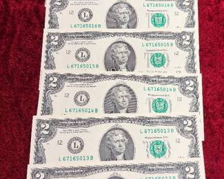 10 consecutive two dollar bills