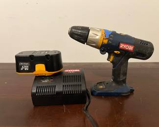 Ryobi Drill Driver with battery and charging station