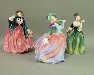 124 Lot 669 Three Royal Doulton porcelain figures