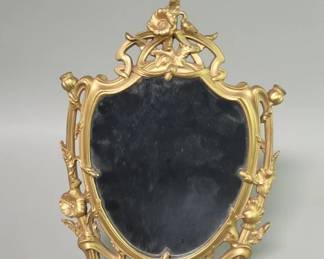 174 Lot 596 Art Nouveau gilt spelter table mirror