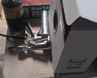 Coleman Deluxe Two-Burner Propane Camping Stove, Manual Grease Gun, and 100ft Clear Vinyl Tubing Lot