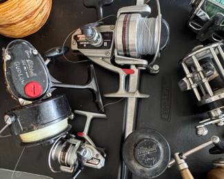 Vintage Assorted Spinning and Conventional Fishing Reel Collection second image
