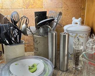 Assorted Kitchen Countertop Utensils and Storage Set with OXO Salad Spinner, Electric Salt and Pepper Mills, Dog Bone Treat Jar, Pyrex Measuring Cup, and Utensil Crocks