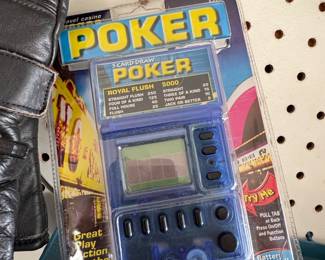 MGA Entertainment Vegas Poker Handheld Electronic Game