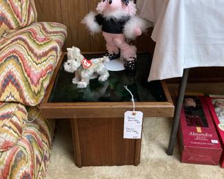 square end table, stuffed dogs