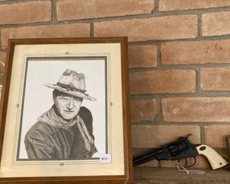 John Wayne print, cap revolver