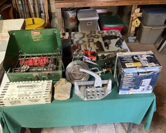 Coleman camp stove, WWII canteen, propane bottle top heater, tile cutter, commercial electronic lock, etc.