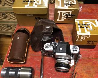 Vintage Nikon FTn with attached 50mm lens & 24mm & 13.5 cm lens’ & matching # boxes