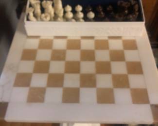 Alabaster pedestal chess table & playing pieces