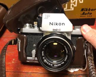 Vintage Nikon FTn 35 mm SLR with attached 50mm lens & 24mm & 13.5 cm lens’ & matching # boxes