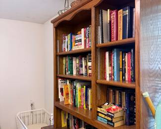 Bookcase with assortment of books