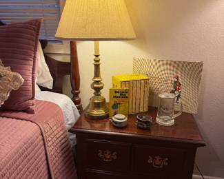 Brass table lamp, wooden nightstand/end table, bedroom furniture, bedside table