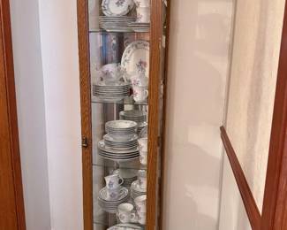 Perfect size lighted, China, hutch with loaded plates, tea, cups, and salsa, cereal, bowls, salad, plates, and dessert plates