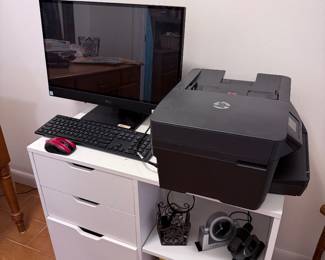 Computer monitor, printer, and White workstation