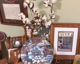 Cotton stem arrangement, framed cotton art, decorative plate, football décor, framed wall art, and rustic farmhouse accents.