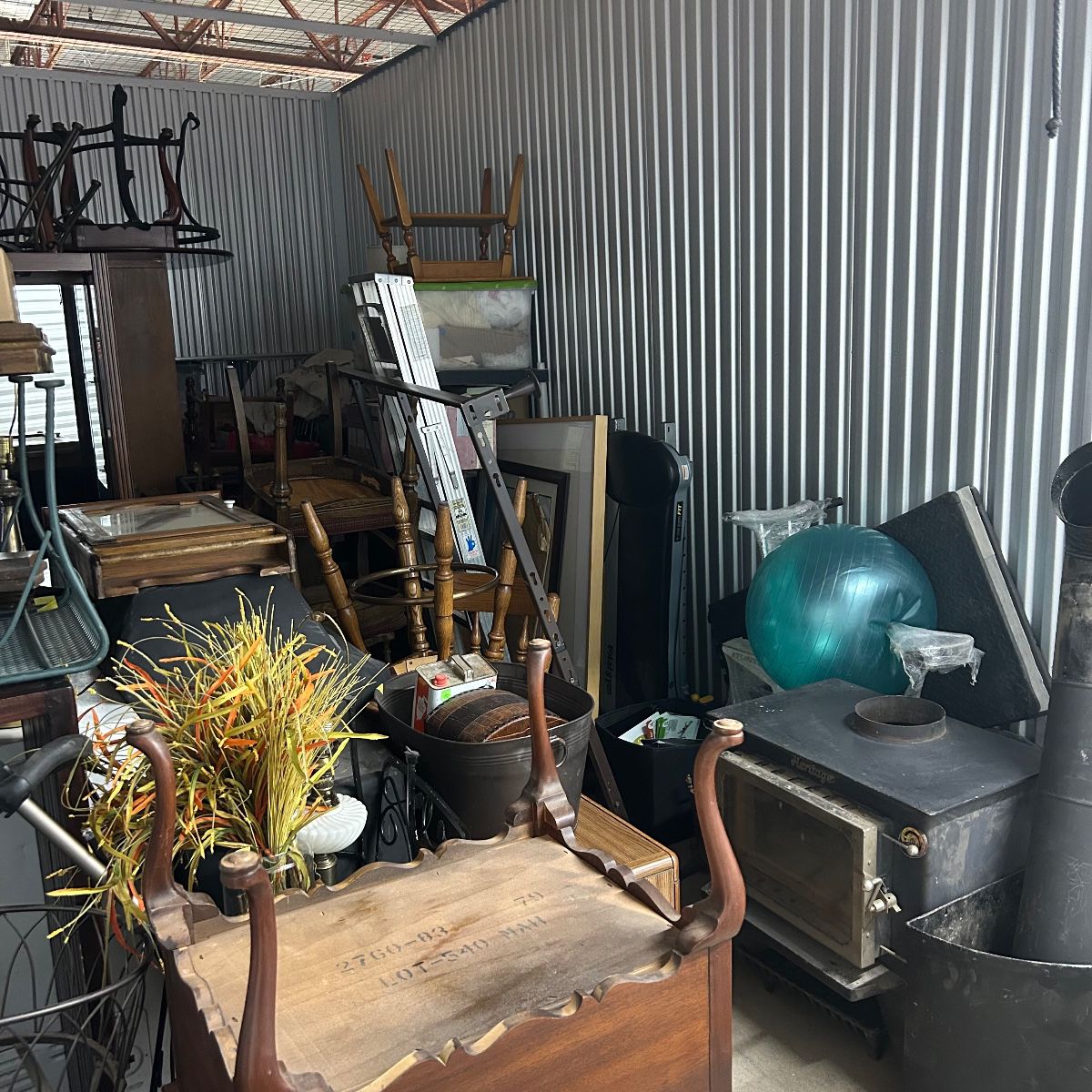 Huge 10’x20’ Storage Unit full of solid furniture, electronics, work out equipment, and so much more