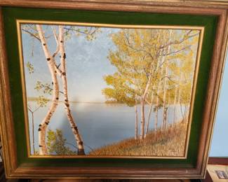 Beautiful original oil painting signed by Vicki White depicting a peaceful lakeside scene with birch and aspen trees overlooking calm water. The artwork features warm autumn tones and comes professionally framed in an elegant wood frame with a green and gold liner that complements the painting beautifully.  This is an exceptional decorative piece that would look wonderful in a lake house, cabin, office, or traditional home. Original signed artwork with excellent detail and a timeless nature-inspired design.  Original hand-painted artwork Signed by Vicki White (lower right corner) Professionally framed and ready to hang Birch and lakeside landscape scene Excellent estate condition  Price: $175 plus shipping or local pickup.