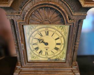 Seth Thomas Mantel Clock – Early 1900s–1930s – Ornate Carved Case   Vintage Seth Thomas mantel clock with carved wood case and Roman numeral dial. Classic ST hands and decorative floral corner accents. Early 20th‑century production. Condition as shown; beautiful display piece. Buyer pays shipping or local pickup.  Value: $75 Brand: Seth Thomas Era: 1900–1930