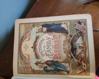 Holman Promoters’ Edition Parallel Bible, early 1900s. Authorized and Revised Versions in side‑by‑side columns. Heavy embossed cover, worn edges, solid binding. Value $35–$60.