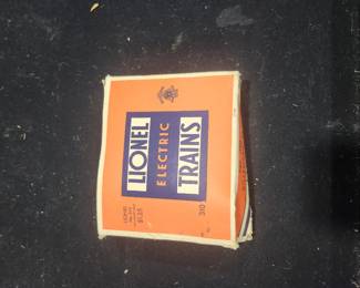 Vintage Lionel No. 310 Billboard Set (1949-1951) for O and O-27 gauge trains. Includes all five original advertising billboards and the factory Lionel box. Features classic 1950s Atlantic, General Tire, Plymouth, Frigidaire, and Heinz advertisements. One billboard has minor damage. $65 plus actual shipping cost or local pickup available.