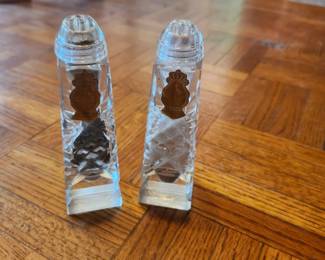 Vintage crystal-style salt and pepper shakers with gold crown emblems and faceted cut-glass design. Elegant table display pieces. Good condition as shown. Buyer pays shipping or local pick up. Price $28 for the pair.