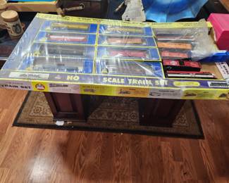 Vintage HO Scale Train Collection. New Old Stock and never opened. Includes numerous locomotives, freight cars, and accessories in original factory packaging and display box. Estate fresh and collector quality. Contents appear complete and unused. Ideal for train collectors or hobby enthusiasts. Asking $395 OBO.