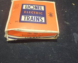 Vintage Lionel No. 310 Billboard Set (1949-1951) for O and O-27 gauge trains. Includes all five original advertising billboards and the factory Lionel box. Features classic 1950s Atlantic, General Tire, Plymouth, Frigidaire, and Heinz advertisements. One billboard has minor damage. $65 plus actual shipping cost or local pickup available.