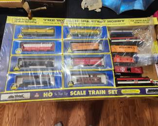 Vintage HO Scale Train Collection. New Old Stock and never opened. Includes numerous locomotives, freight cars, and accessories in original factory packaging and display box. Estate fresh and collector quality. Contents appear complete and unused. Ideal for train collectors or hobby enthusiasts. Asking $395 OBO.